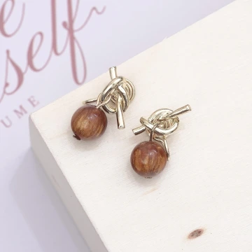 打結棕圓珠&times;蚊香盤U型耳夾