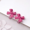桃紅塗鴉蝴蝶結&times;蚊香盤U型耳夾-第2張