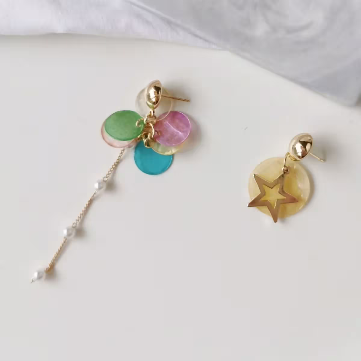 炫彩貝殼紋星星×不對稱吊隊耳環-第1張