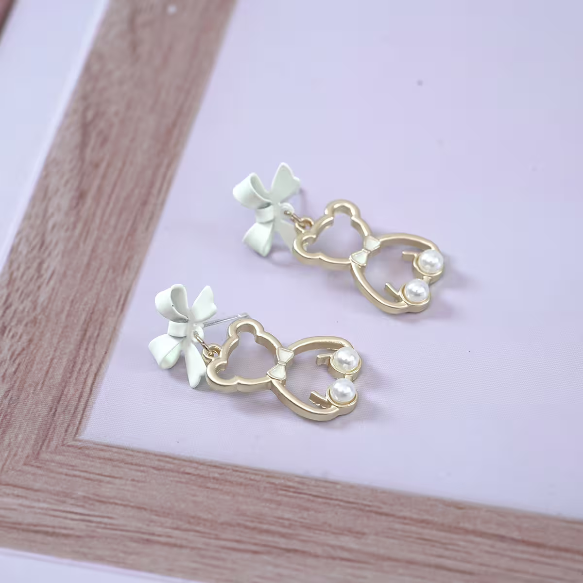 白蝴蝶結小熊輪廓珍珠×吊墜耳環-第4張