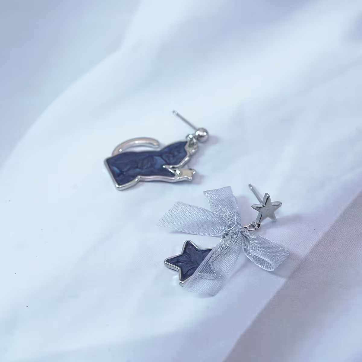 炫藍貓咪蝴蝶結星星×不對稱吊墜耳環-第2張