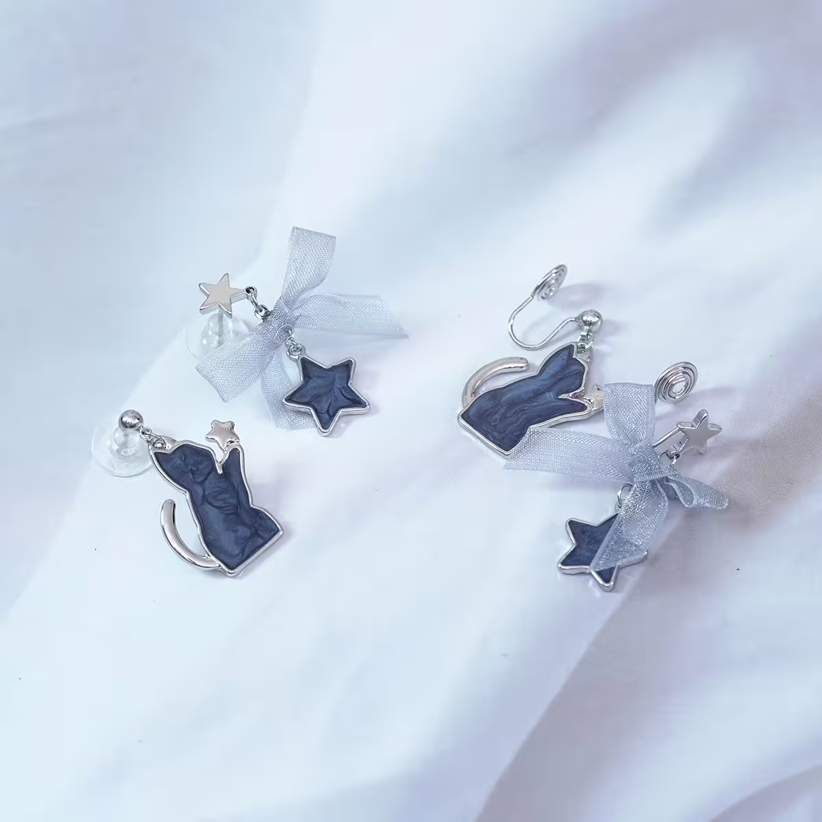 炫藍貓咪蝴蝶結星星×不對稱吊墜耳環-第4張