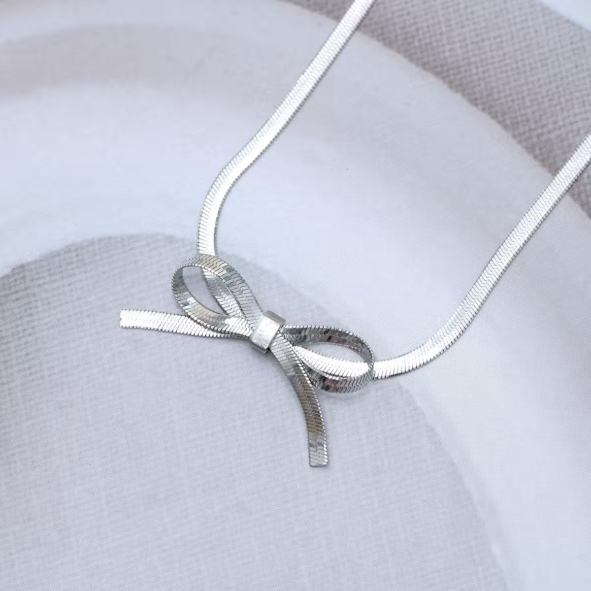 316鋼飾&times;扁平蛇骨蝴蝶結&times;手鍊&times;銀色-第3張