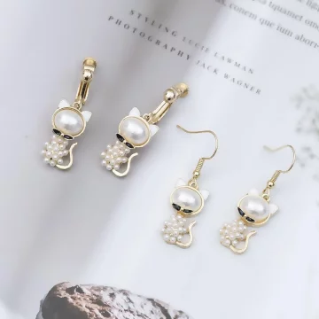 白珍珠小貓咪×螺旋耳夾.avif