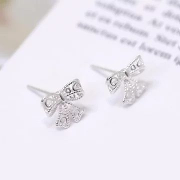 925銀針×鏤空蕾絲蝴蝶結×耳環.avif