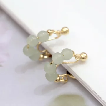 綠玉串珠×蚊香盤U型耳夾.avif