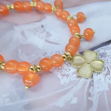 結果的橙色四葉草×固定式串珠手鍊.avif