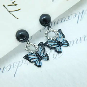 湛藍黑蝴蝶×三角耳夾.avif