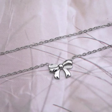 316鋼飾×禮物蝴蝶結×鎖骨項鍊×銀色.avif