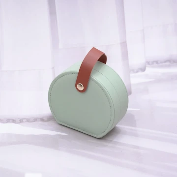 半月形皮革×小手提飾品盒×咖綠.avif