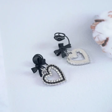 甜酷黑蝴蝶結愛心×蚊香盤U型耳夾.avif