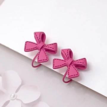桃紅塗鴉蝴蝶結&times;蚊香盤U型耳夾.avif