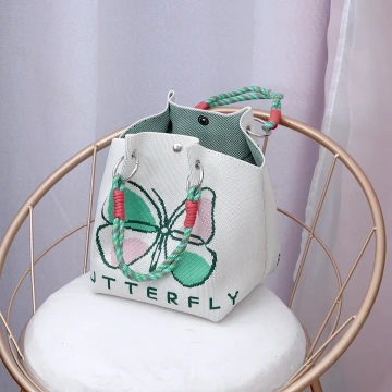 粉綠蝴蝶&times;針織手提袋.avif
