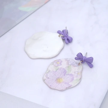 紫花蝴蝶結&times;U型耳夾.avif